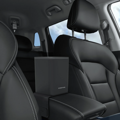 Black car headrest cover with 'NINASTARS' branding on a car seat.