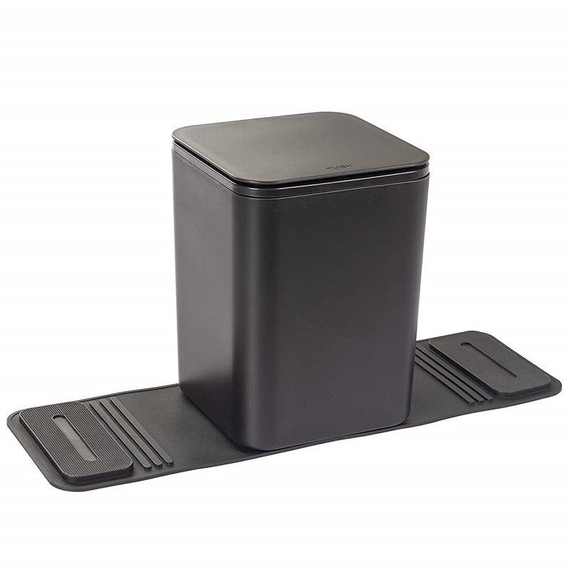 A medium-sized black car trash can with lid and a pair of dark colored grip strips attached to its base.