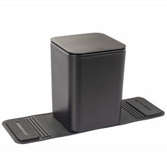 A medium-sized black car trash can with lid and a pair of dark colored grip strips attached to its base.